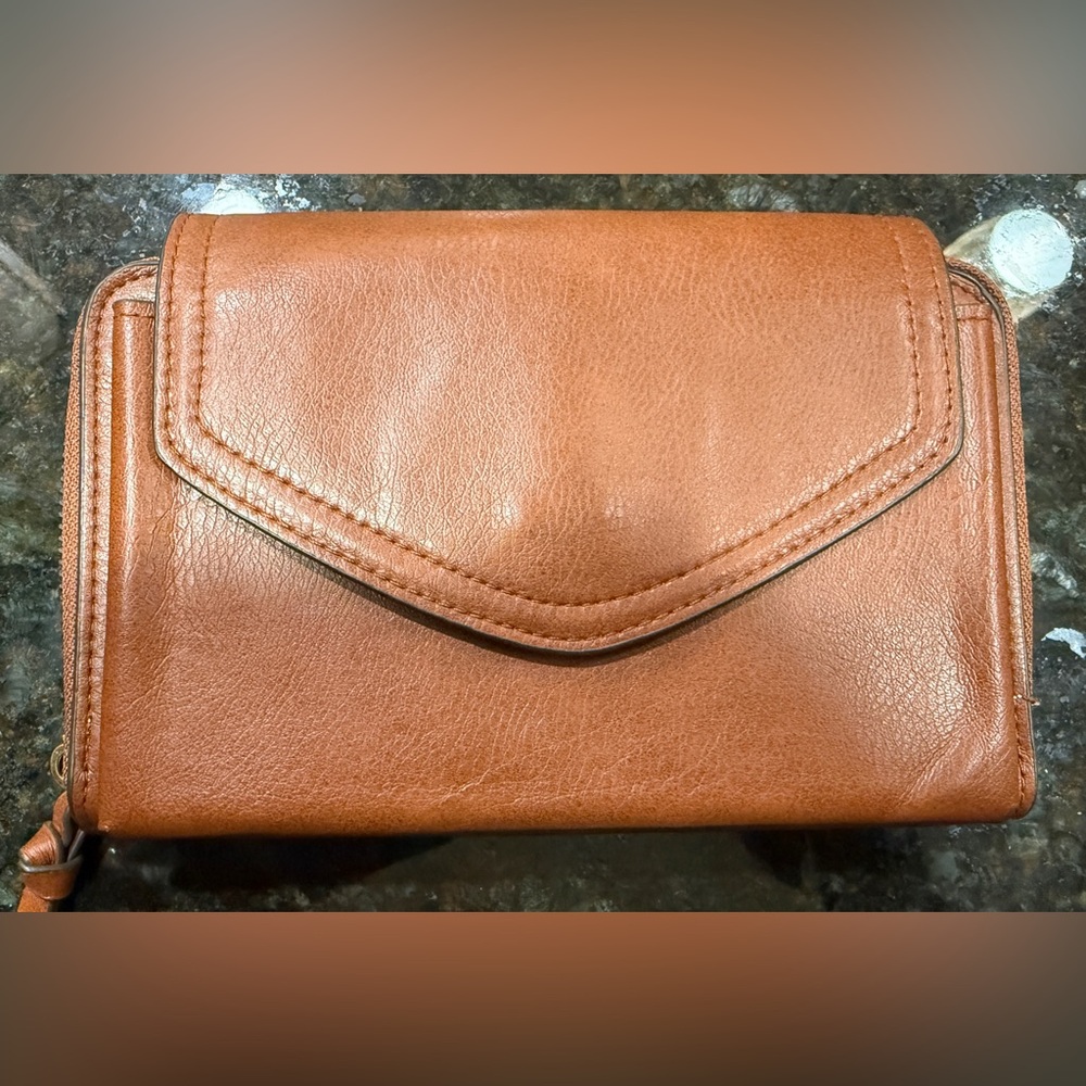Safe keeper Wallet with hooks to attach a strap. Great condition.